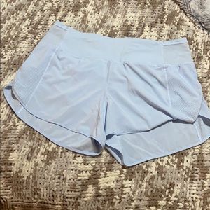 Lululemon light blue shorts.  Size 12